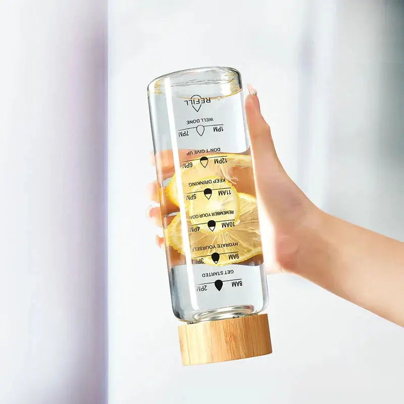 Bouteille d'eau en verre de 1L avec indicateur de temps