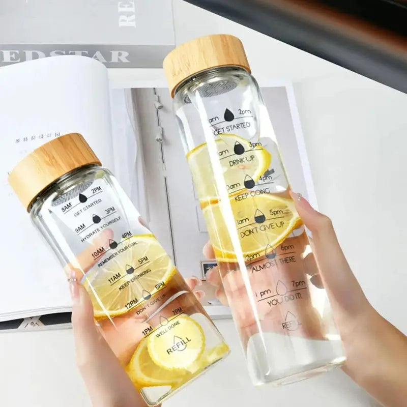 Bouteille d'eau en verre de 1L avec indicateur de temps